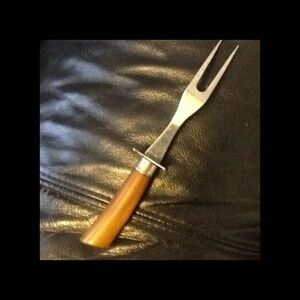A vintage bakelite (tested) roasting fork- The handle is a nice butterscotch.